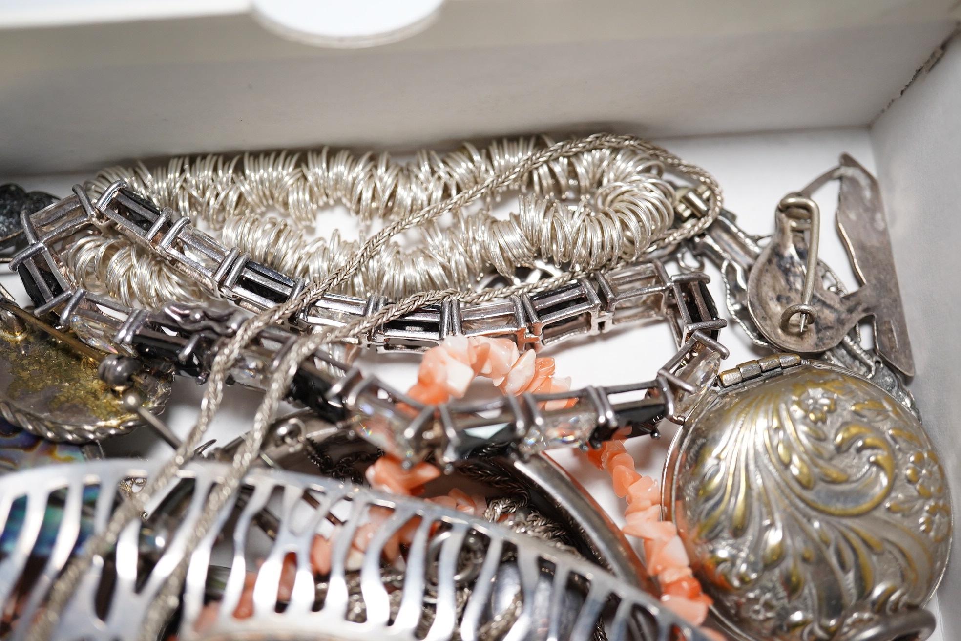 Assorted silver and jewellery including hinged bangle, pendants, brooches etc. Condition - poor to fair